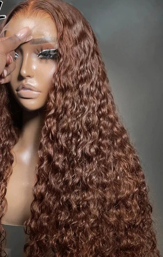 Lace front HD pre-plucked chocolate brown human hair wig by JNETTE CHANEL with natural-looking hairline and soft wave texture.